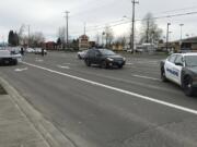 Vancouver police investigate after a man was run over Thursday afternoon by a black Subaru Crosstrek on Southeast Mill Plain Boulevard near Southeast 136th Street.