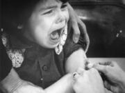 John Hernandez, 4, cries as he receives a measles vaccination on Jan. 22, 1977, during an outbreak. Once the measles vaccination was introduced to the general public in 1963, outbreaks shrank in size and frequency until the year 2000 when it was declared eradicated in the United States.