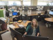 Kaley McLachlan-Burton, an environmental outreach specialist with Clark County Public Health, monitors the department’s social media feeds while working at the Clark County Public Health offices in Vancouver. McLachlan-Burton has been part of a three-person team spearheading communications for Public Health during the measles outbreak. The team is essential to debunking vaccine and measles misinformation that appears online.