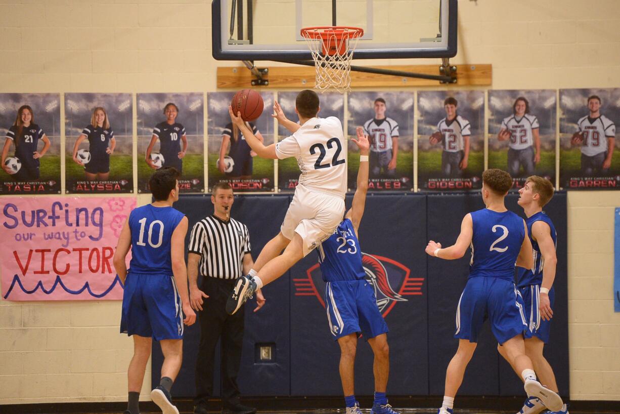 King's Way sophomore Bryce Dodge shoots a lay-up during a game against La Center at King's Way Christian School in Vancouver on Friday, February 1, 2019. King's Way beat La Center 67-65 in overtime.