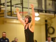 Prairie’s Nicholas Langer celebrates his victory over Kelso’s Blake Fowler in the 182-pound weight class.