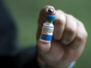 A vial of the measles vaccine is displayed at the Kaiser Permanente Cascade Park office in Vancouver.