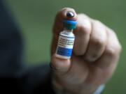 A vial of the measles vaccine is displayed at the Kaiser Permanente Cascade Park office.