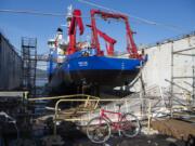 Repairs are done to a ship on the dry docks at Vigor on Swan Island in Portland.