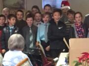 RIDGEFIELD: South Ridge Elementary School fourth graders perform for residents at Highgate Senior Living Center during a visit in December.