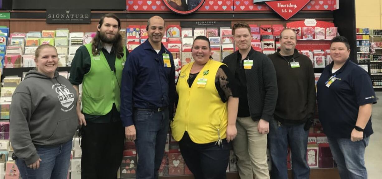 Hudson Bay: Representatives from the Police Activities League of Vancouver and Walmart on Grand Boulevard, which awarded the league a $2,300 grant for the league’s mentoring program.