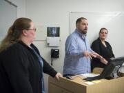 Clark College students Heather Leasure, from left, Ryan Oaks and Shalana Marshall talk with a group of their student peers about sexual harassment prevention and intervention during a College 101 class at Clark College on Tuesday morning. This student volunteer program was made possible by a grant from the Office on Violence Against Women.