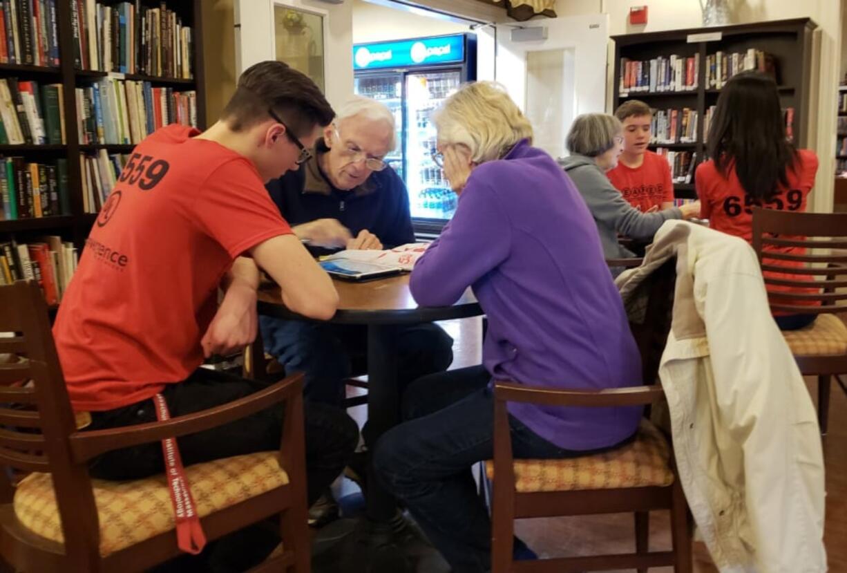 Fairway-164th Ave.: Union High School students in the robotics club worked with residents at Touchmark at Fairway Village retirement home to teach the seniors how to use their electronics as part of the school’s Techie Bootcamp program.