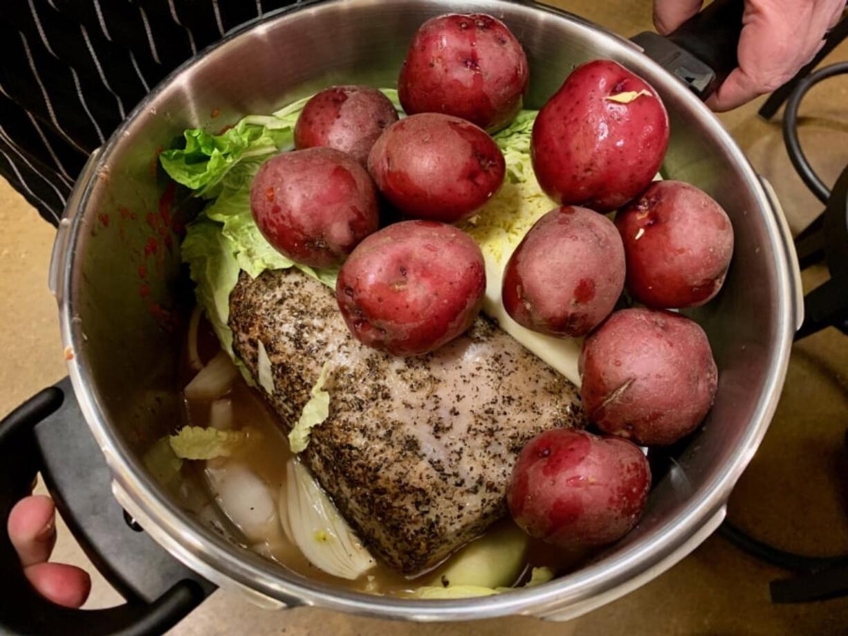 Ingredients for pork pot roast in a pressure cooker.