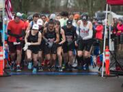 Runners start the Vancouver Lake Half Marathon on Sunday morning, February 24, 2019.