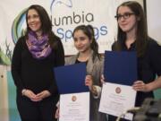 U.S. Rep. Jaime Herrera Beutler, R-Battle Ground, from left, recognizes Ojasvi Kamboj and Annika Epperly as winners of the Congressional App Challenge at the Columbia Springs education center Wednesday.