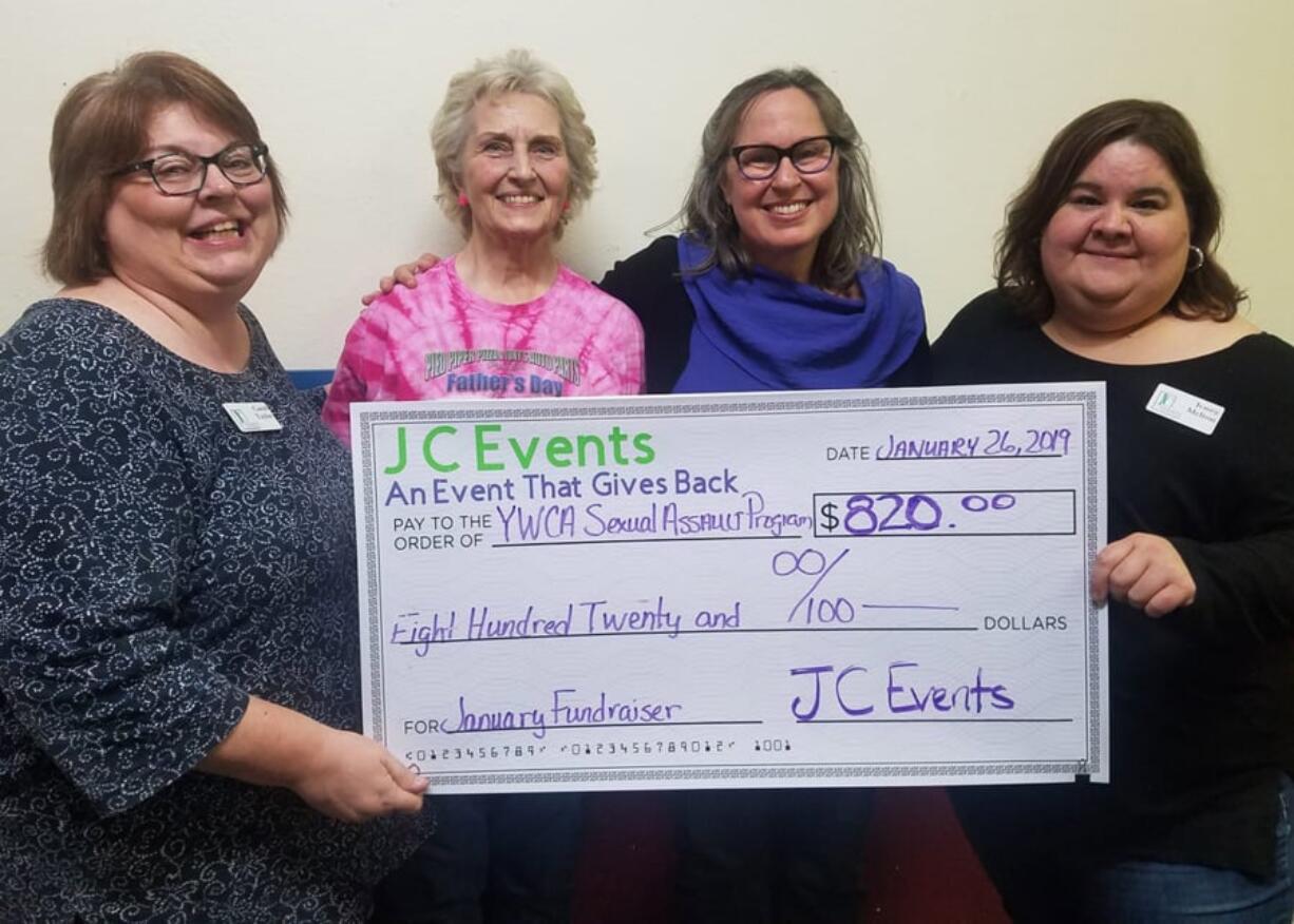 Orchards: Carol Taylor of JC Events, from left, Cheryl Eggert of Pied Piper Pizza, Laurie Schacht of Clark County YWCA and Jennifer Melton of JC Events at JC Events’ Bunco Night fundraiser, which brought in $820 for the YWCA’s Sexual Assault Program.