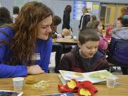 Washougal: Kalli and Liam Goodpastor at Gause Elementary School’s “Muffins with Moms” reading event.