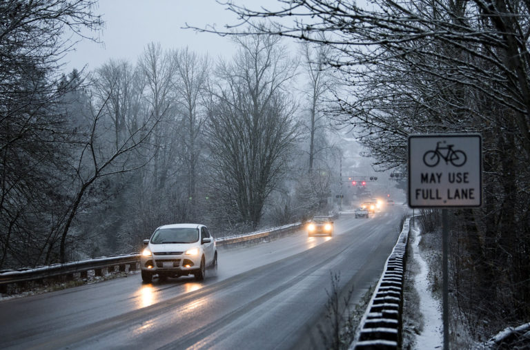 Snow gathers on Fruit Valley Road near the Burnt Bridge Creek Trail in Vancouver on Monday morning, Feb. 25, 2019.