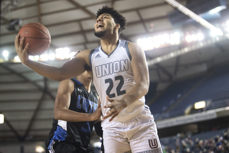 Union's Alishawuan Taylor completes a layup against Curtis during the 4A Hardwood Classic at the Tacoma Dome on Thursday, Feb. 28, 2019.