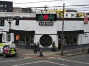 A pedestrian walks past Luepke Flowers and Finds on Wednesday afternoon, Feb. 27, 2019, which has announced it is set to close on Feb. 28.