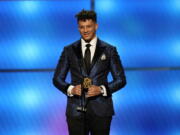 Patrick Mahomes of the Kansas City Chiefs accepts the award for AP offensive player of the year at the 8th Annual NFL Honors at The Fox Theatre on Saturday, Feb. 2, 2019, in Atlanta.