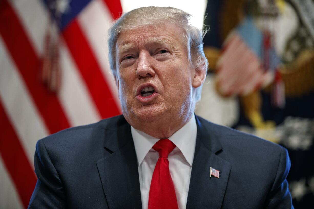 In this Feb. 1, 2019, photo, President Donald Trump speaks in the Cabinet Room of the White House in Washington. The White House says Trump will call for optimism and unity in his State of the Union address, using the moment to attempt a reset after two years of bitter partisanship and deeply personal attacks. But skepticism will emanate from both sides of the aisle when Trump enters the House chamber Tuesday for the primetime address to lawmakers and the nation.