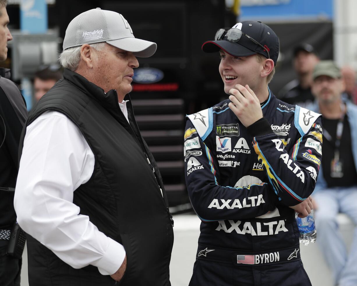 Car owner Rick Hendrick, left, talks with William Byron on pit road during qualifying for the Daytona 500 auto race at Daytona International Speedway, Sunday, Feb. 10, 2019, in Daytona Beach, Fla.