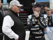 Car owner Rick Hendrick, left, talks with William Byron on pit road during qualifying for the Daytona 500 auto race at Daytona International Speedway, Sunday, Feb. 10, 2019, in Daytona Beach, Fla.