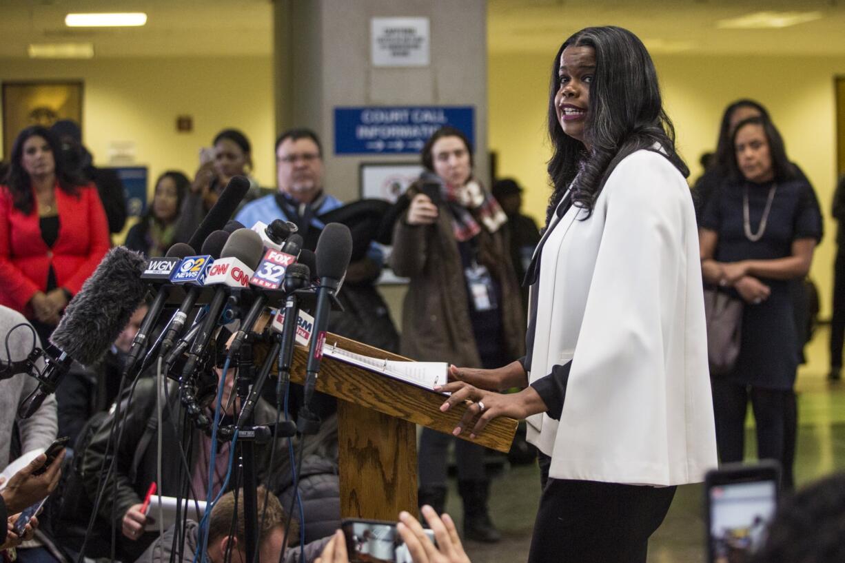 Cook County State's Attorney Kim Foxx speaks to reporters at the Leighton Criminal Courthouse after R. Kelly was ordered held on a $1 million bond, Saturday, Feb. 23, 2019 in Chicago.  Cook County Judge John Fitzgerald Lyke Jr. has set Kelly’s bond at $1 million saying that the amount equals $250,000 for each of the four people he’s charged with sexually abusing.