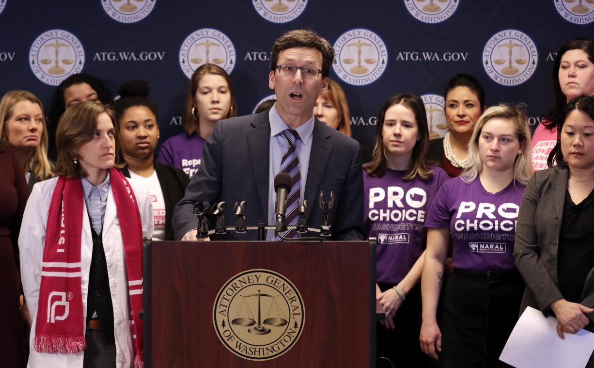 Washington state Attorney General Bob Ferguson speaks at a news conference announcing a lawsuit challenging the Trump administration's Title X "gag rule" Monday, Feb. 25, 2019, in Seattle. The rule issued last Friday would impact federal funding for reproductive health care and family planning services.