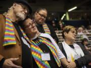 Ed Rowe, from left, Rebecca Wilson, Robin Hager and Jill Zundel react to the defeat of a proposal that would allow LGBT clergy and same-sex marriage within the United Methodist Church Tuesday at the denomination’s 2019 Special Session of the General Conference in St. Louis.