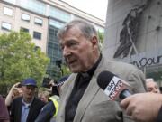 Cardinal George Pell leaves the County Court in Melbourne, Australia, Tuesday, Feb. 26, 2019. The most senior Catholic cleric ever charged with child sex abuse has been convicted of molesting two choirboys moments after celebrating Mass, dealing a new blow to the Catholic hierarchy’s credibility after a year of global revelations of abuse and cover-up.