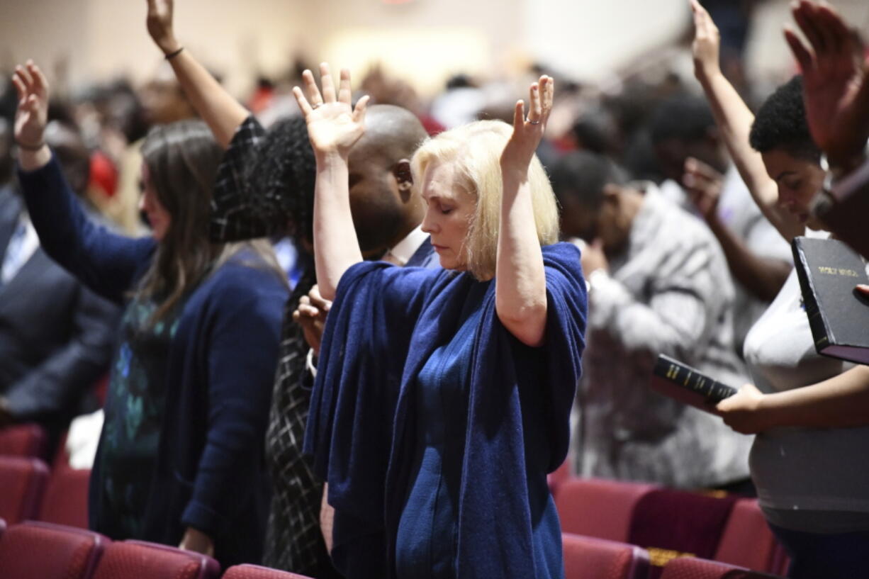 U.S. Sen. Kirsten Gillibrand worships at Mount Moriah Missionary Baptist Church in North Charleston, S.C., Sunday, Feb. 10, 2019. Gillibrand spent three days in the state as part of her effort to introduce her potential presidential campaign to the state’s heavily African-American Democratic primary electorate.