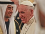 Pope Francis smiles upon his arrival at the Abu Dhabi airport, United Arab Emirates, Sunday, Feb. 3, 2019. Francis travelled to Abu Dhabi to participate in a conference on interreligious dialogue sponsored the Emirates-based Muslim Council of Elders, an initiative that seeks to counter religious fanaticism by promoting a moderate brand of Islam.