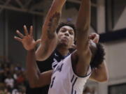 Gonzaga forward Brandon Clarke, left, blocks a shot from Loyola Marymount guard James Batemon during the second half of an NCAA basketball game Thursday, Feb. 14, 2019, in Los Angeles.