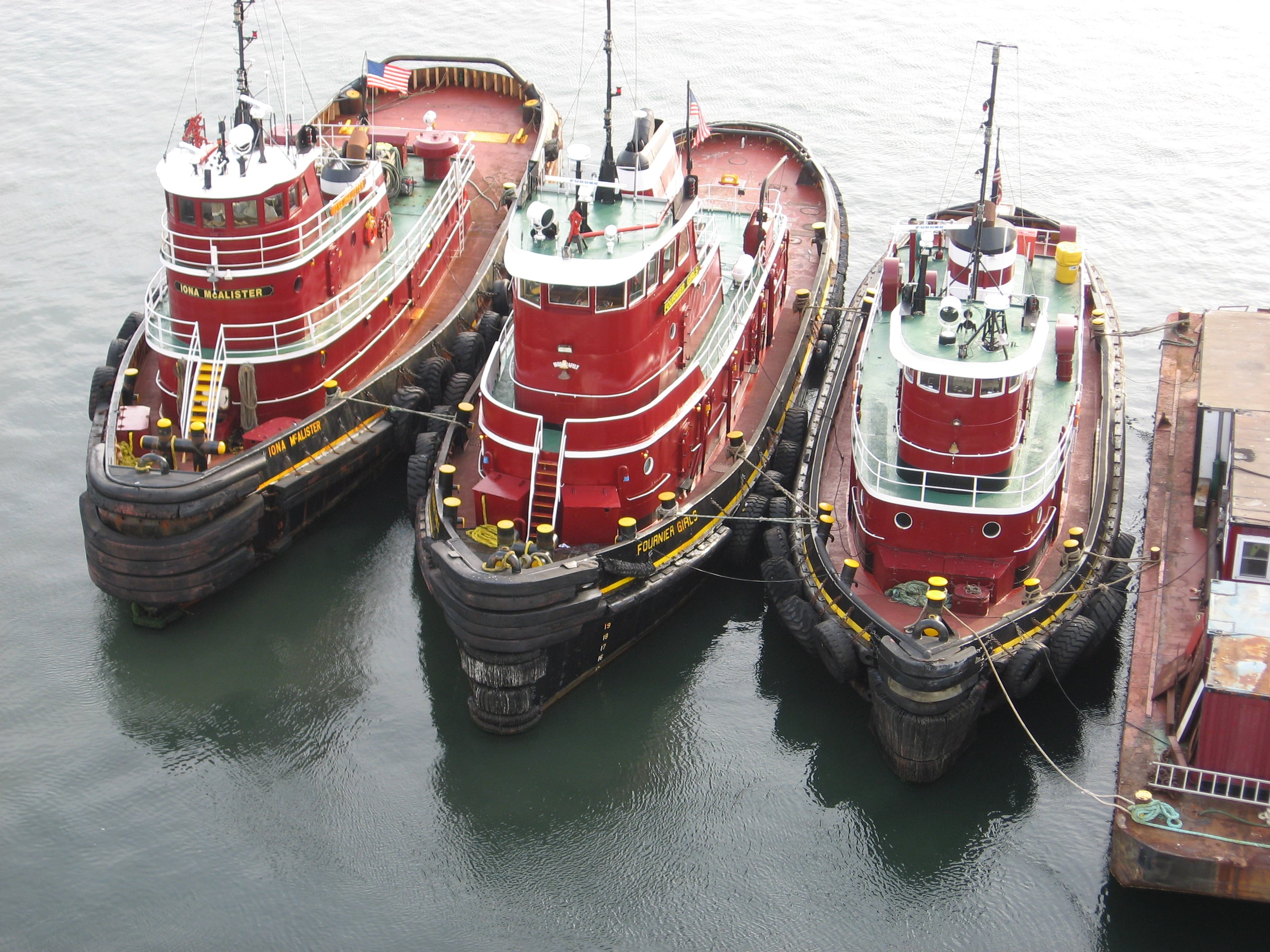Tugs at Prince Edward Island by Larry Juday