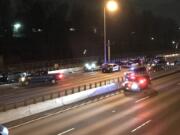 Both directions of Interstate 84 were closed between Interstates 205 and 5 in Portland. Police are investigating a car chase that crossed state lines from Vancouver, erupted into gunfire and ended with the arrest of another suspect in the homicide of Kelso convenience store clerk Kayla Chapman, 30.