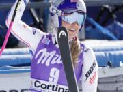 United States’ Lindsey Vonn waves at the finish area of an alpine ski, women’s World Cup downhill in Cortina D’Ampezzo, Italy, Saturday, Jan. 19, 2019.