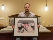 Andy Miller with a photo of his wedding day about 20 years ago when he married Jaime Miller. Jaime Miller, who was known as the life of every party, had a piece of legislation crafted in her honor and an endowment fund named after her announced this week.