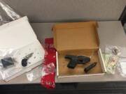 Vancouver police officers say they found these guns and drugs on a wanted Norteno gang member who they arrested earlier this week.