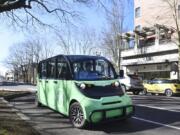 The original Ryd shuttle, parked next to Esther Short Park, was tested in March 2018 before making its debut two months later. Ryd now operates a fleet of three electric five-seat vehicles and plans to launch a ride-hailing app.