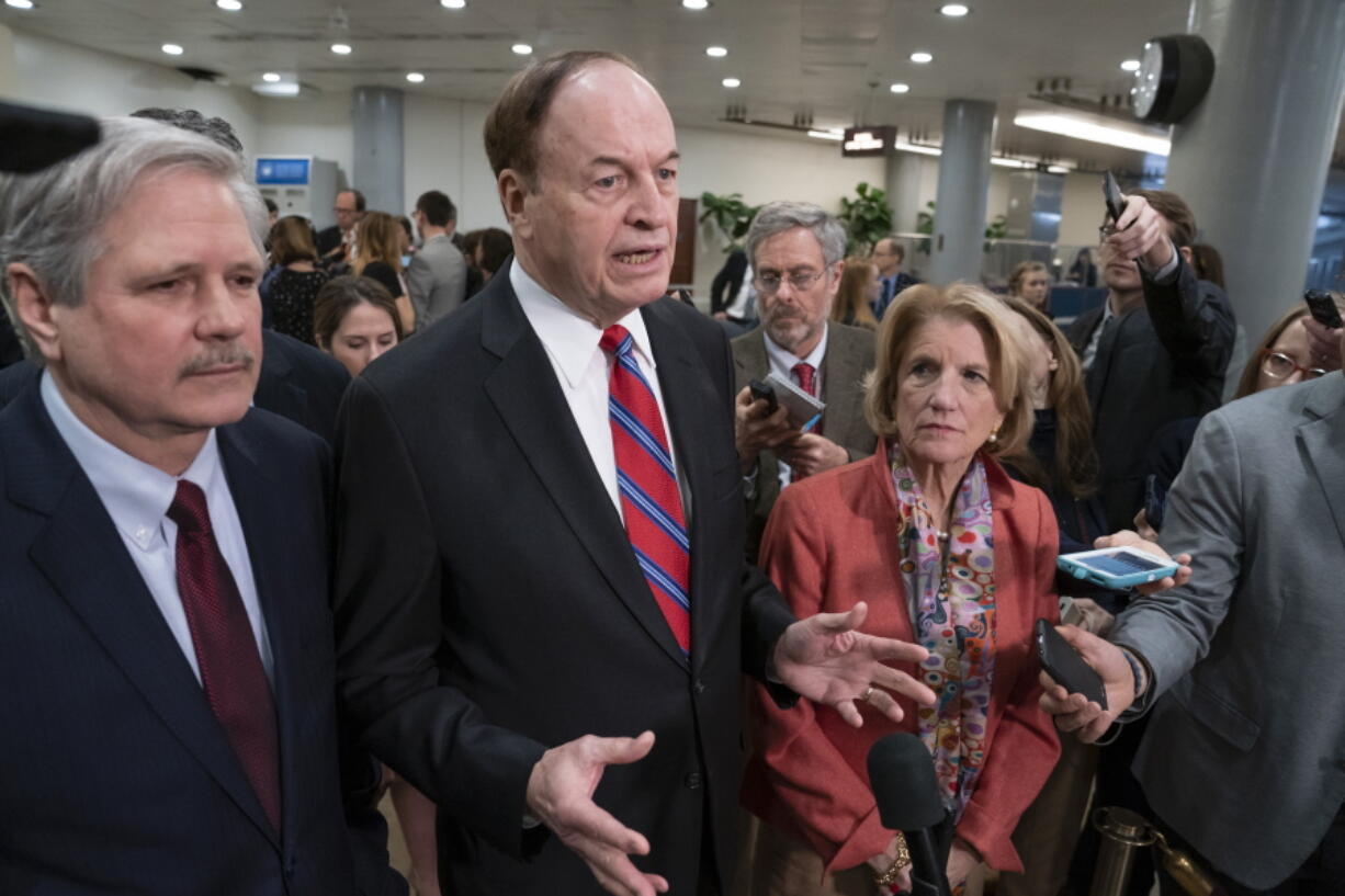 Sen. Richard Shelby, R-Ala., the top Republican on the bipartisan group bargainers working to craft a border security compromise in hope of avoiding another government shutdown, is joined by Sen. John Hoeven, R-N.D., left, and Sen. Shelley Moore Capito, R-W.Va., right, as they speak with reporters after a briefing with officials about the US-Mexico border, on Capitol Hill in Washington, Wednesday, Feb. 6, 2019. Shelby is chairman of the Senate Appropriations Committee (AP Photo/J.