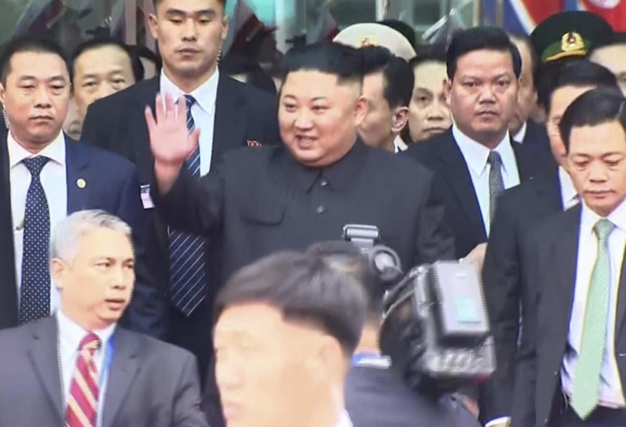 In this image from video, North Korean leader Kim Jong Un waves upon arrival in Dong Dang in Vietnamese border town Tuesday ahead of the second summit with U.S. President Donald Trump.