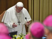 Pope Francis prays at the opening of a sex abuse prevention summit, at the Vatican, Thursday, Feb. 21, 2019. The gathering of church leaders from around the globe is taking place amid intense scrutiny of the Catholic Church’s record after new allegations of abuse and cover-up last year sparked a credibility crisis for the hierarchy.