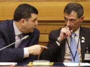 Survivor of sex abuse Francesco Zanardi, right, listens to Mark Rozzi, Democratic member of the Pennsylvania House of Representatives, during a press conference at the Italian Lower Chamber press hall in Rome, Thursday, Feb. 21, 2019. Pope Francis opened a landmark sex abuse prevention summit Thursday by warning senior Catholic figures that the faithful are demanding concrete action against predator priests and not just words of condemnation.