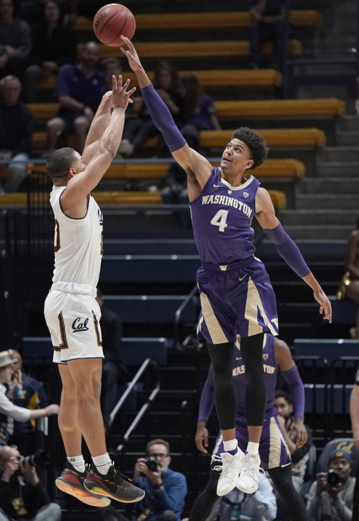 Washington guard Matisse Thybulle (4) blocks a shot by California guard Matt Bradley (20) during the first half of an NCAA college basketball game Thursday, Feb. 28, 2019, in Berkeley, Calif.