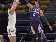 Washington guard Matisse Thybulle (4) blocks a shot by California guard Matt Bradley (20) during the first half of an NCAA college basketball game Thursday, Feb. 28, 2019, in Berkeley, Calif.