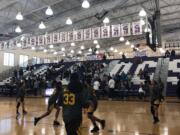 Hudson's bay girls warm up for the 3A regional round of the state tournament against Roosevelt at Garfield High School.