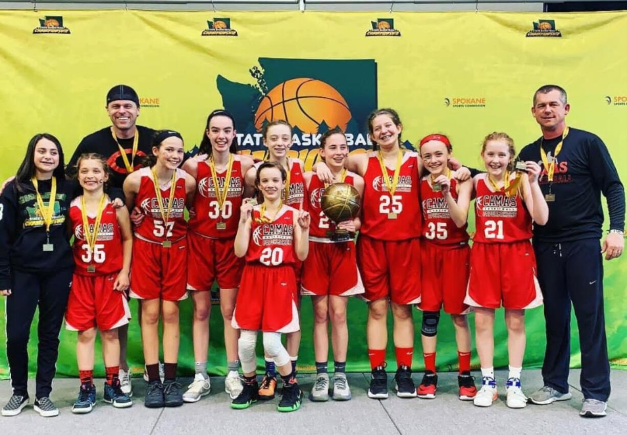 The Washington Middle School Basketball Championship Girls 6th School Gold Champion from Camas include (from left) Kahlia Richman, Raquel Dunnam, Coach Scott Thompson, Kendall Mairs, Stephanie Edwards, Aubrey Hall (in front), Bella Brustad, Sophie Buzzard, Laney Webb, Keirra Thompson, Bridget Quinn, Coach Tad Mairs.