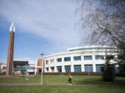 Students walk through the Clark College campus in Vancouver on March 20 during finals week.