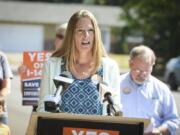 Heidi Yewman, an advocate for reducing gun violence, speaks to media about Initiative 1491 in 2016. More recently, she produced a film about gun violence.