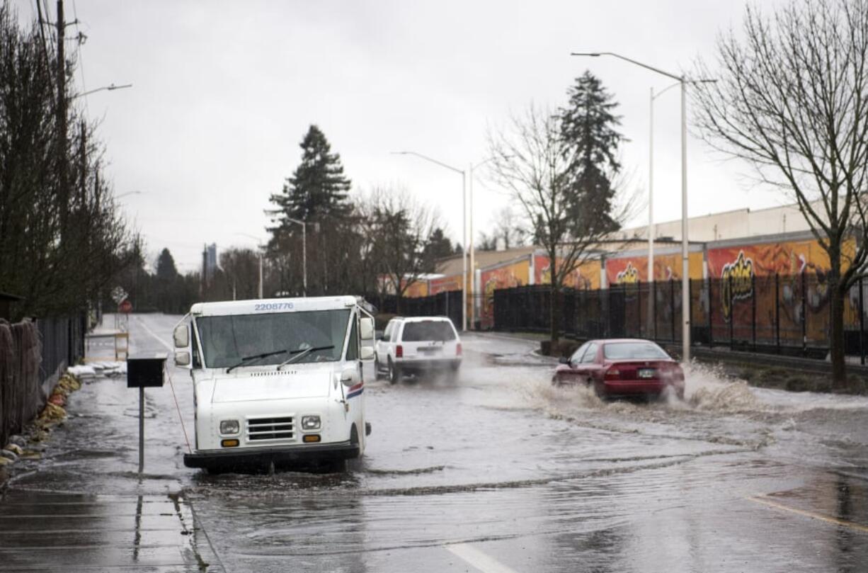 A few times per year, when really hard rain falls, the storm drain system on Fruit Valley Road gets overwhelmed and leads to the sudden appearance of a temporary lake in the roadway. The city of Vancouver is looking for fixes but says land-use regulations and expenses make it difficult.