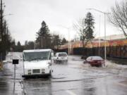 A few times per year, when really hard rain falls, the storm drain system on Fruit Valley Road gets overwhelmed and leads to the sudden appearance of a temporary lake in the roadway. The city of Vancouver is looking for fixes but says land-use regulations and expenses make it difficult.