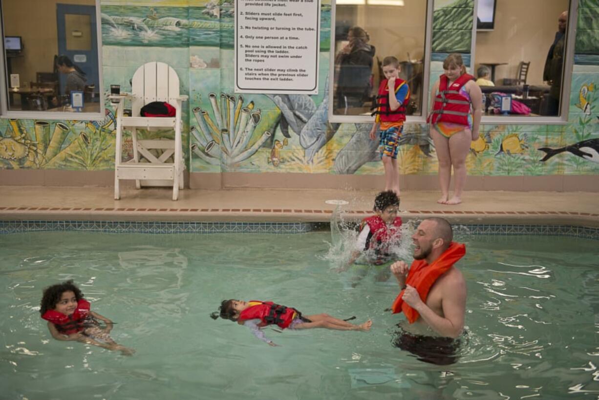 Lacamas Athletic Club Aquatic Director David Crippen, of Vancouver, instructs students on the best methods for floating at Lacamas Athletic Club in Camas. The Club offers free, monthly water safety and swim classes taught by Crippen. The next classes take place March 23, April 27, May 25 and June 22.